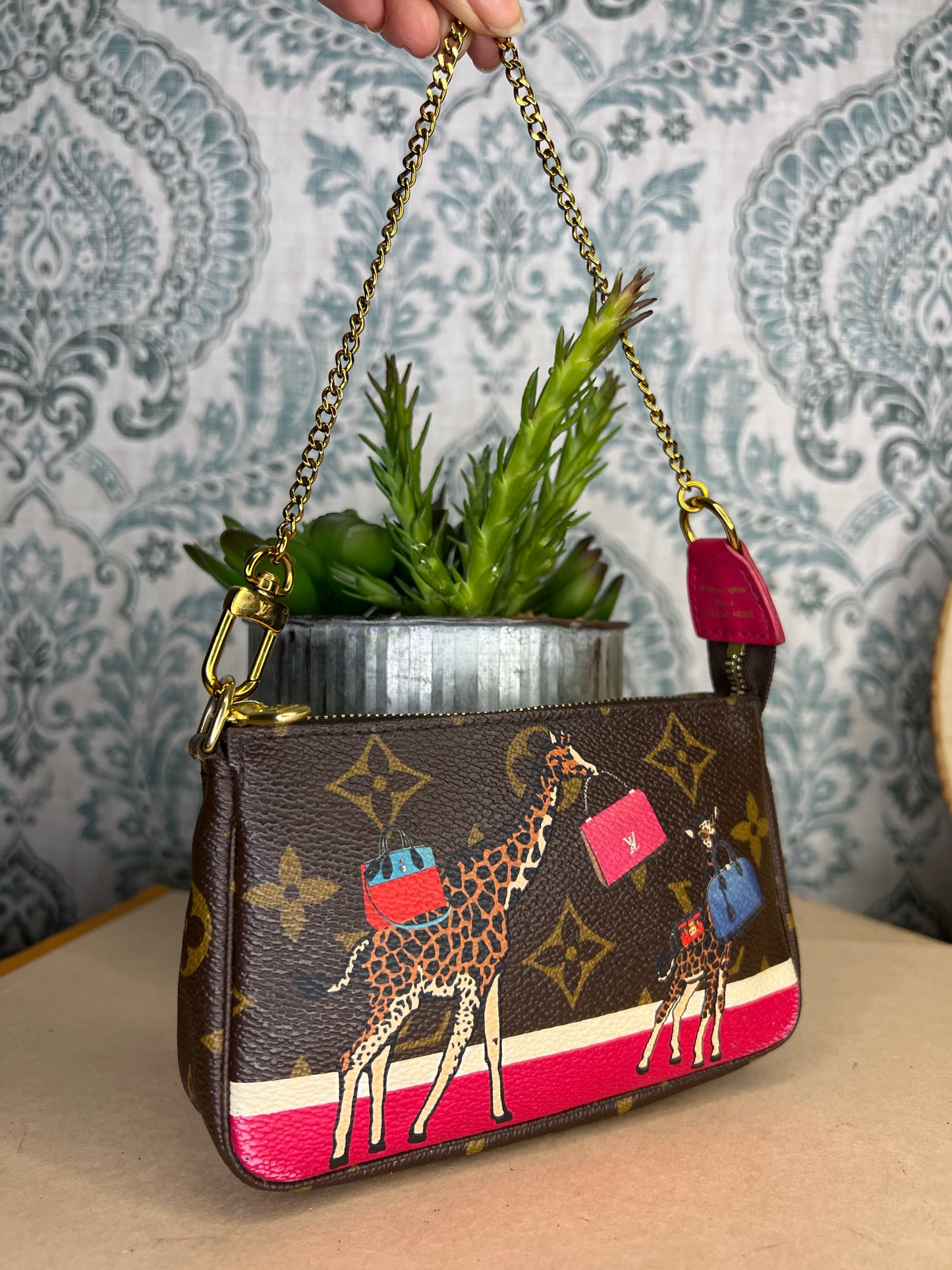 Louis Vuitton Holiday Limited Edition Mini Pochette
