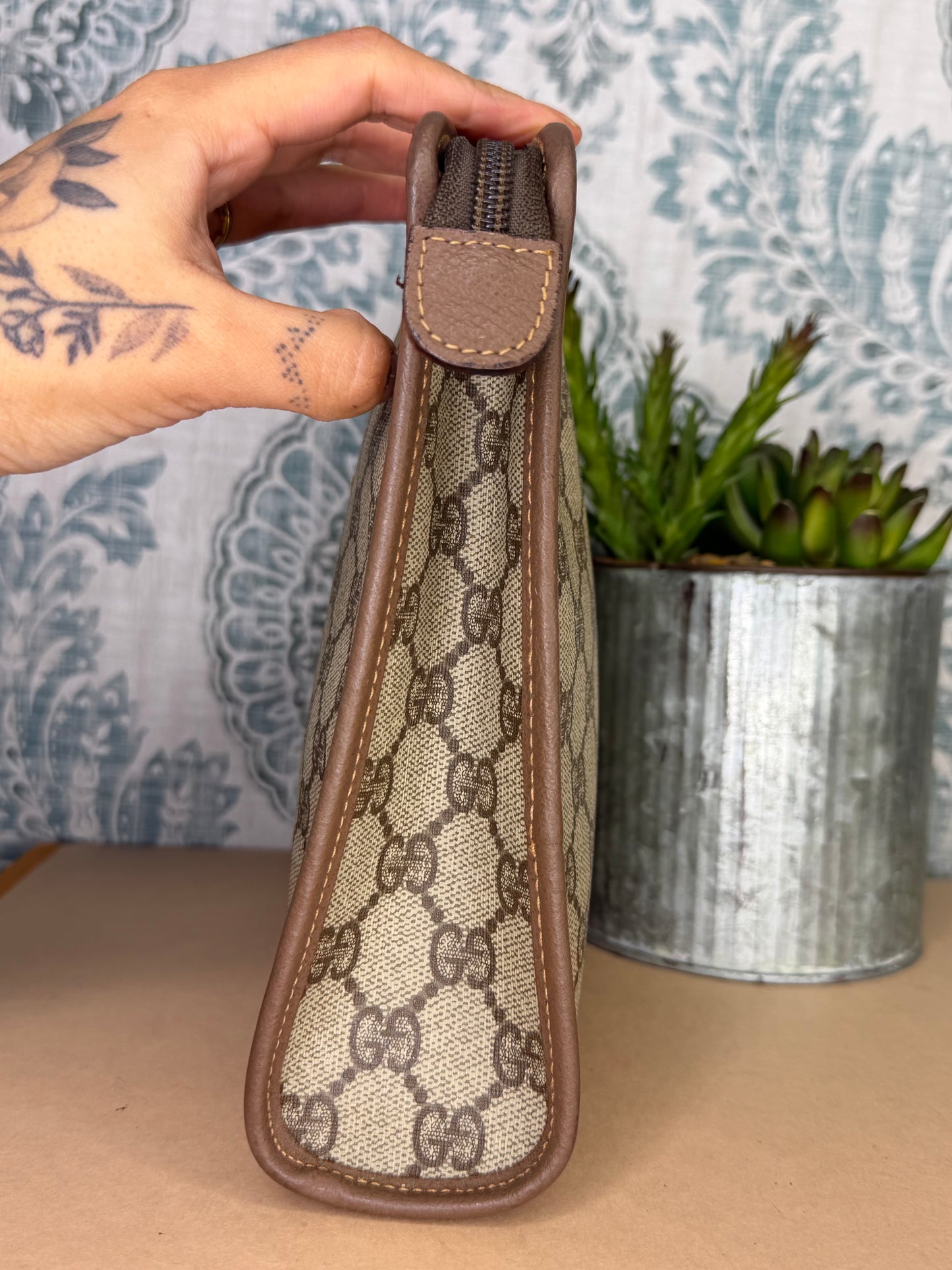 Gucci Supreme Brown Clutch