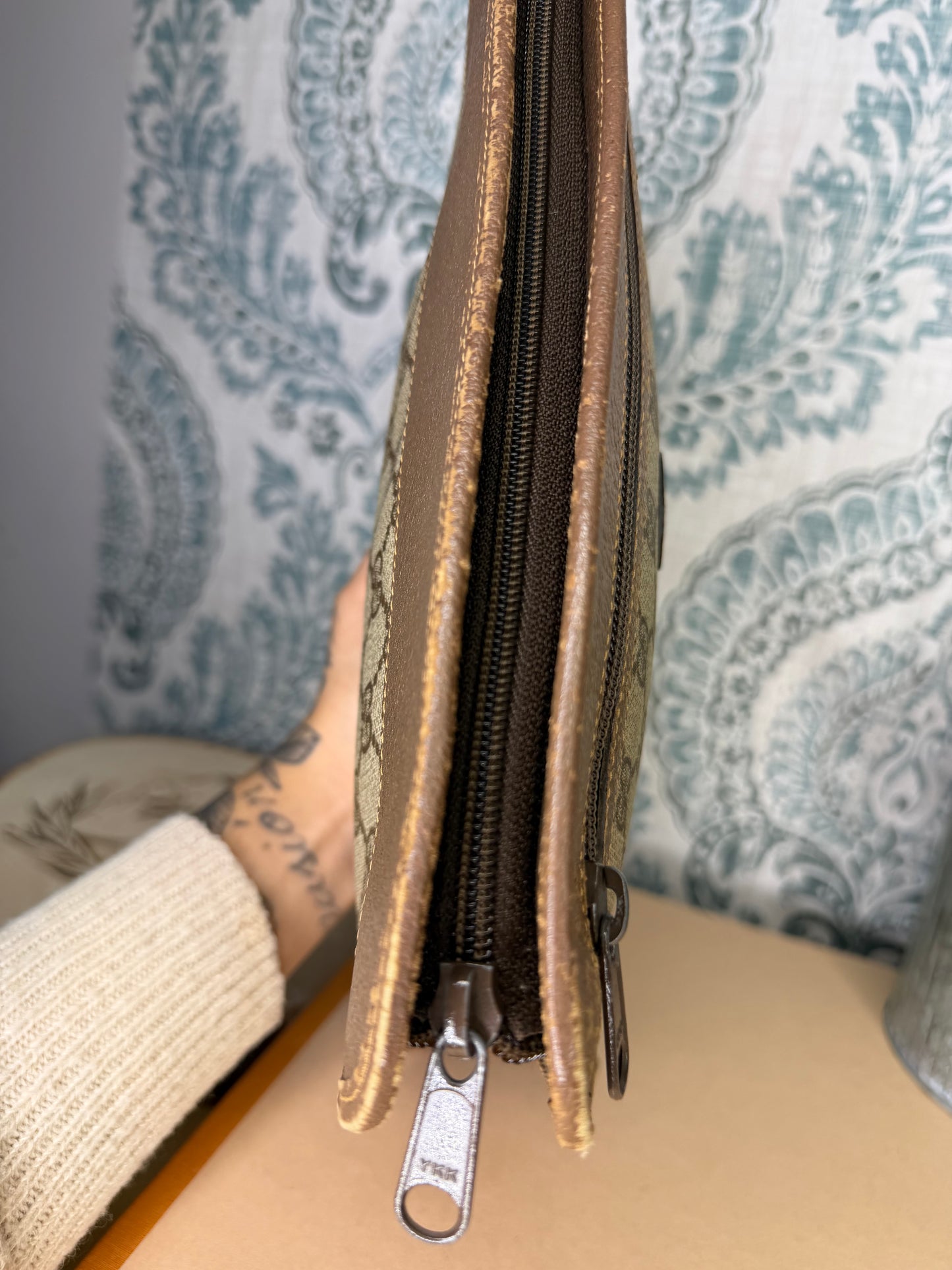 Gucci Supreme Brown Clutch