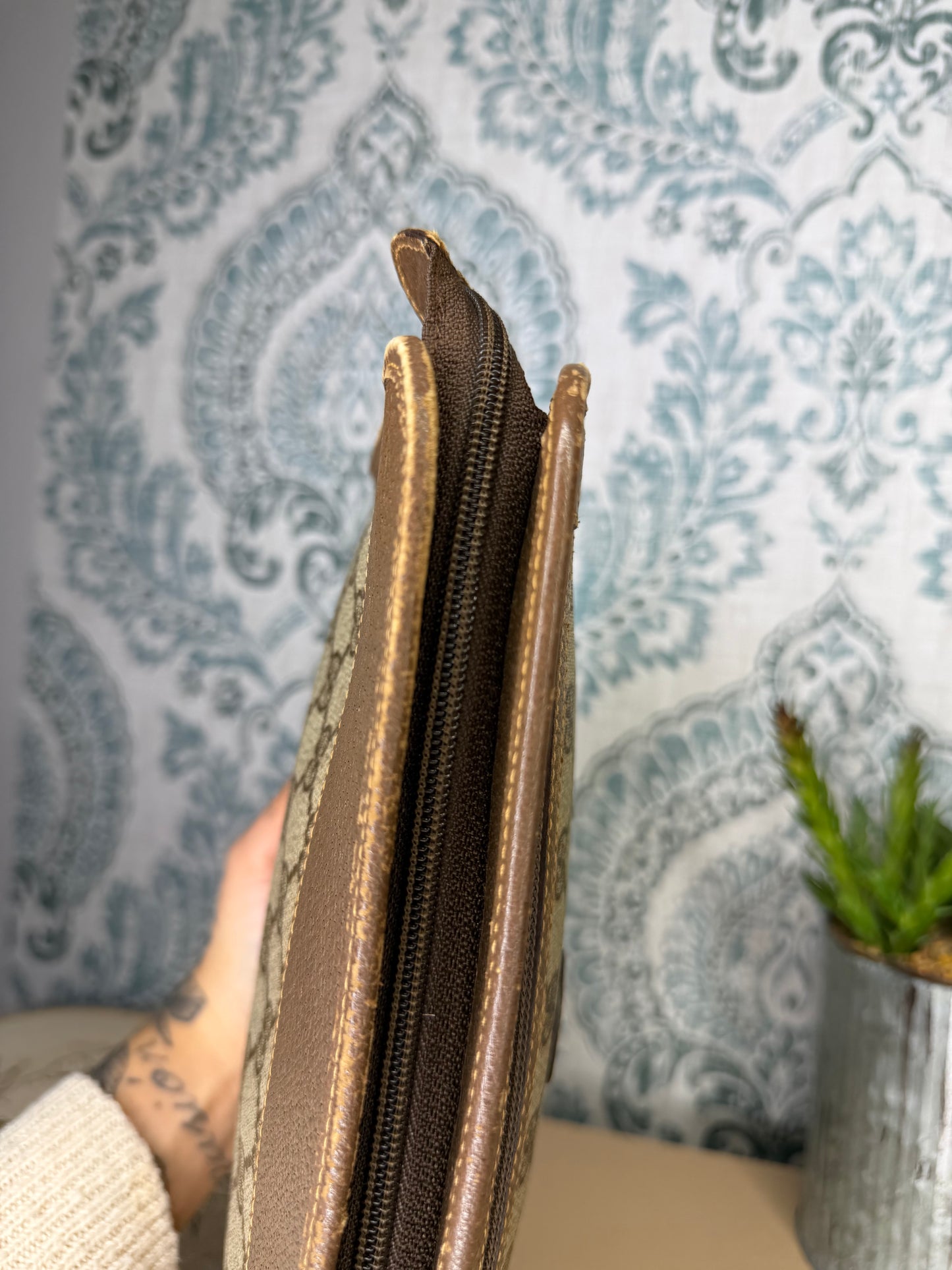 Gucci Supreme Brown Clutch