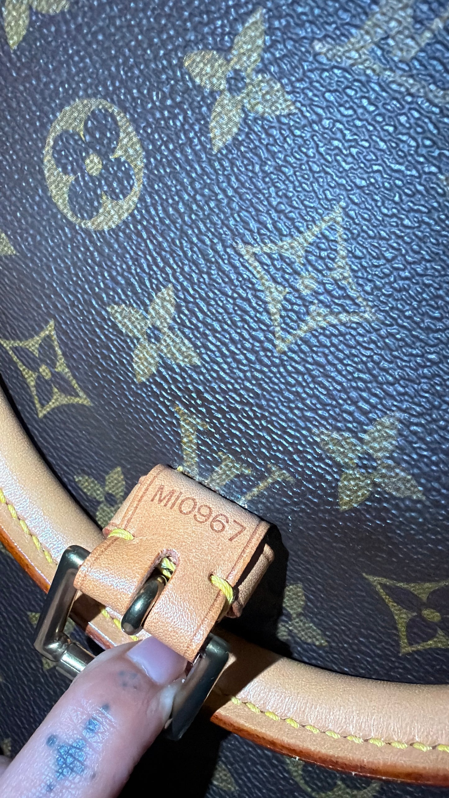 Louis Vuitton Rivoli Handbag