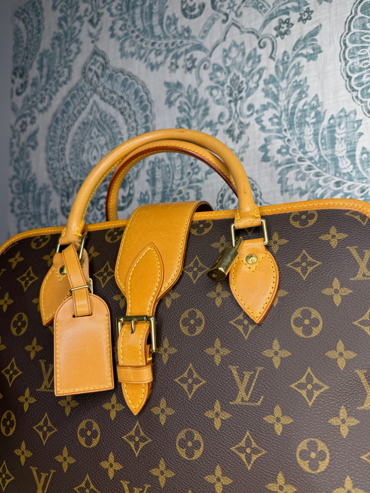 Louis Vuitton Rivoli Handbag