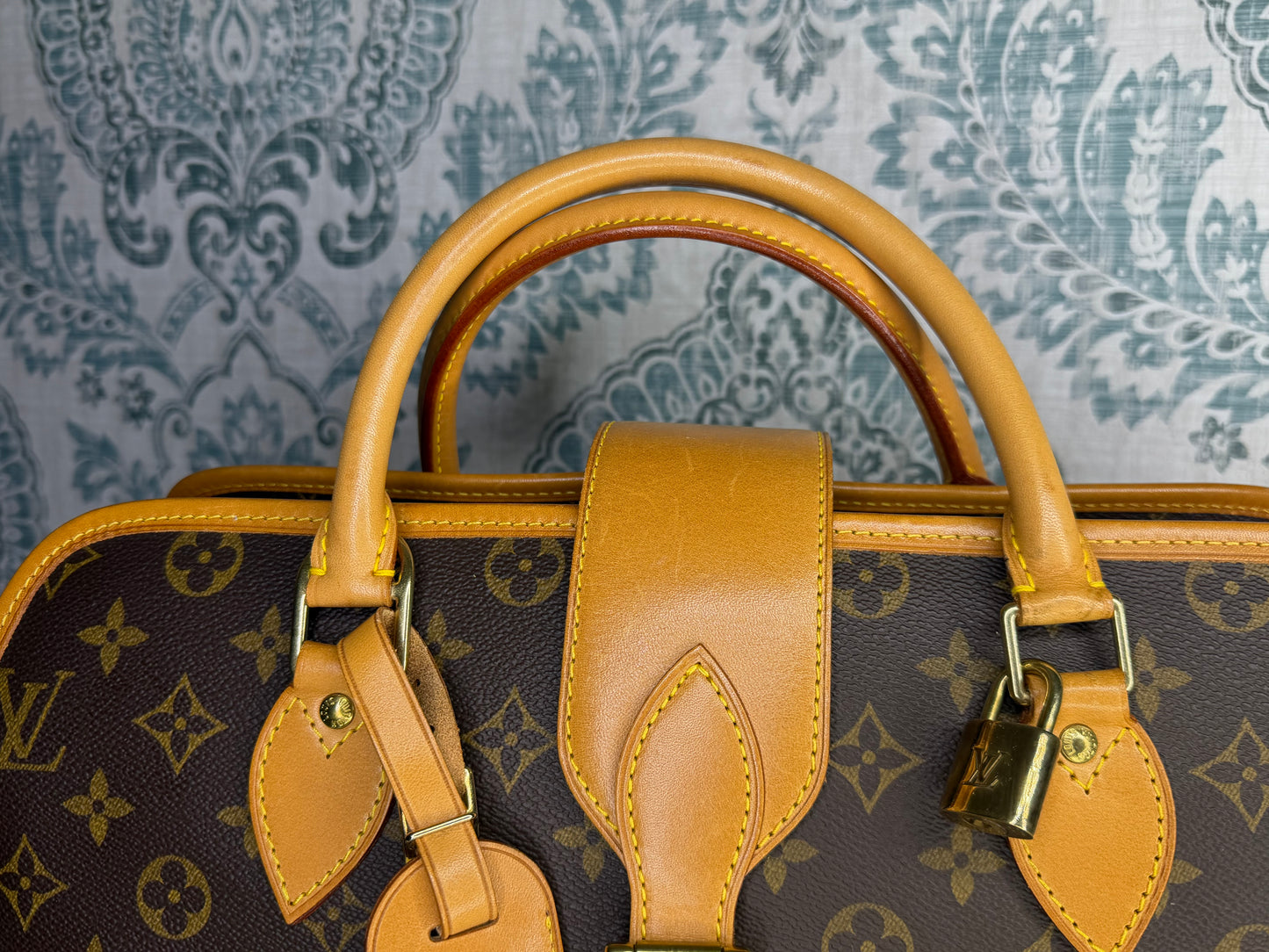 Louis Vuitton Rivoli Handbag