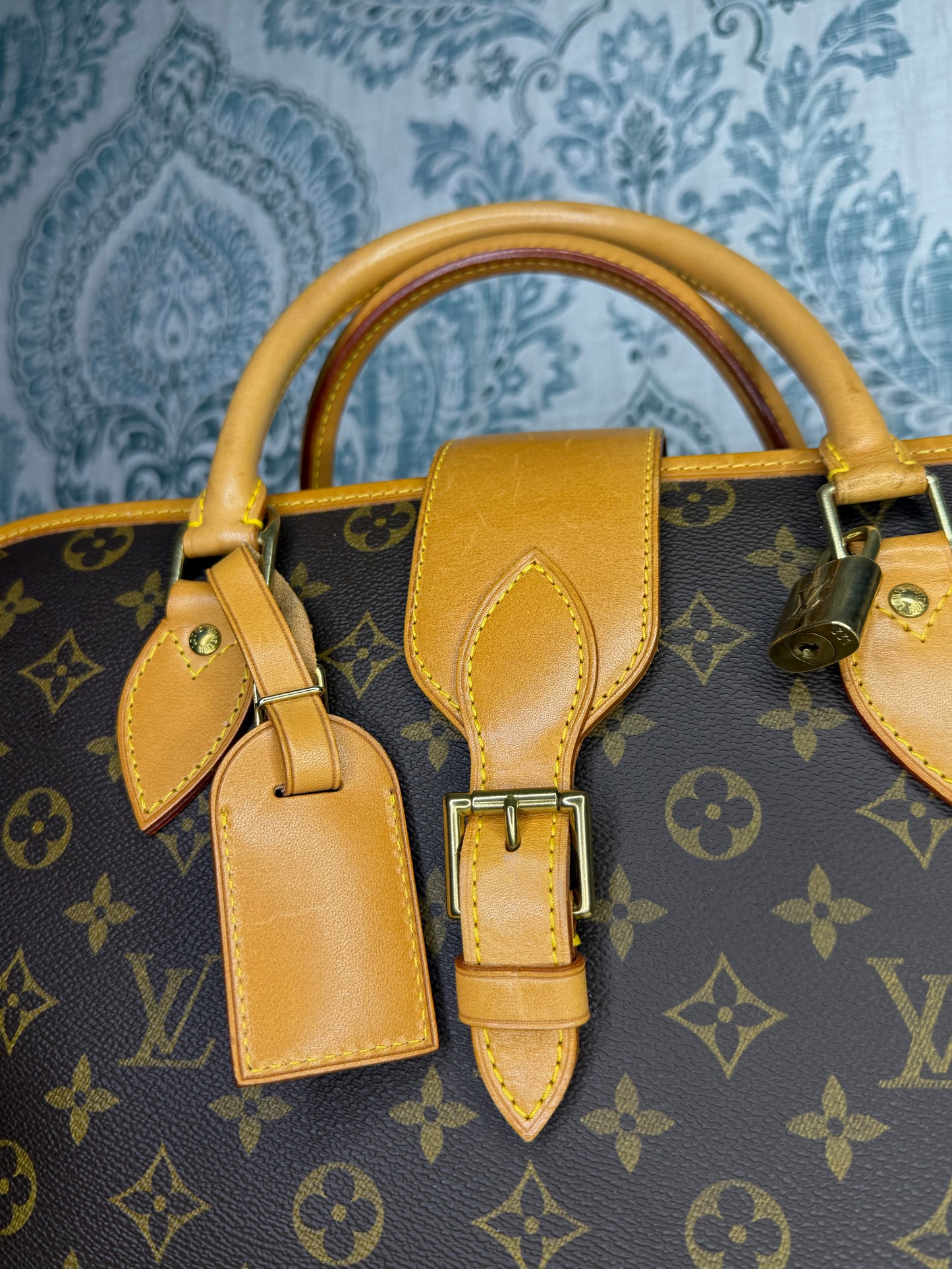 Louis Vuitton Rivoli Handbag
