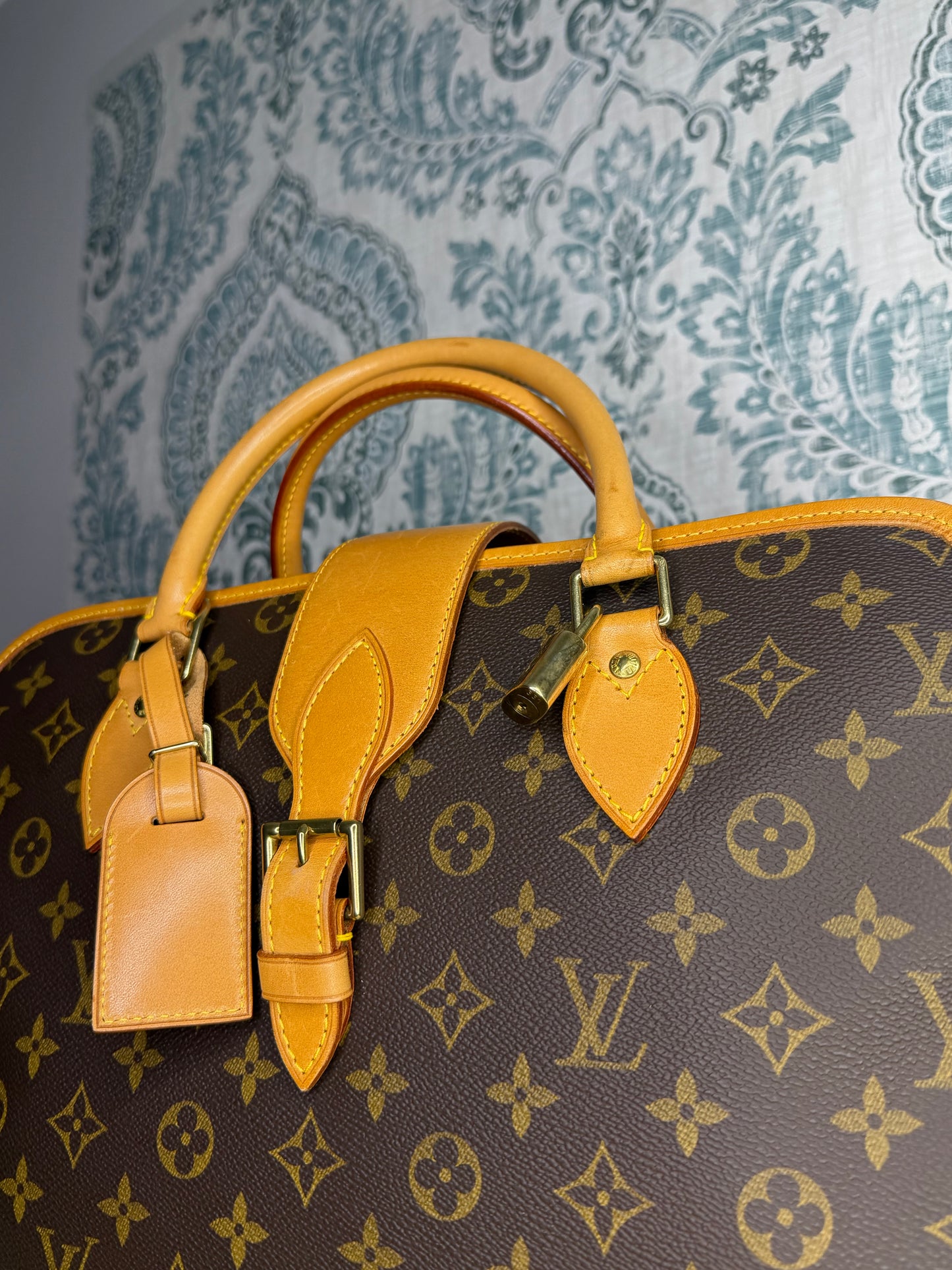 Louis Vuitton Rivoli Handbag