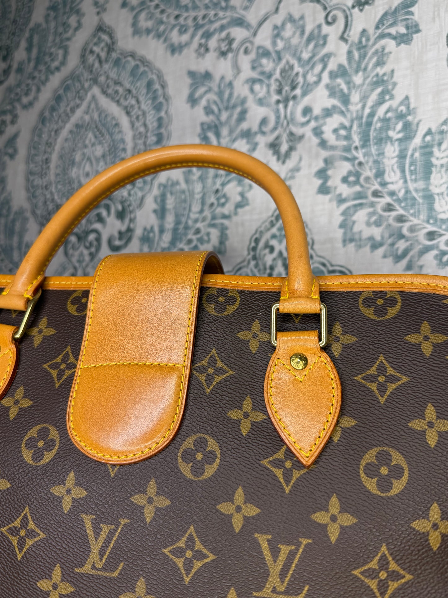 Louis Vuitton Rivoli Handbag