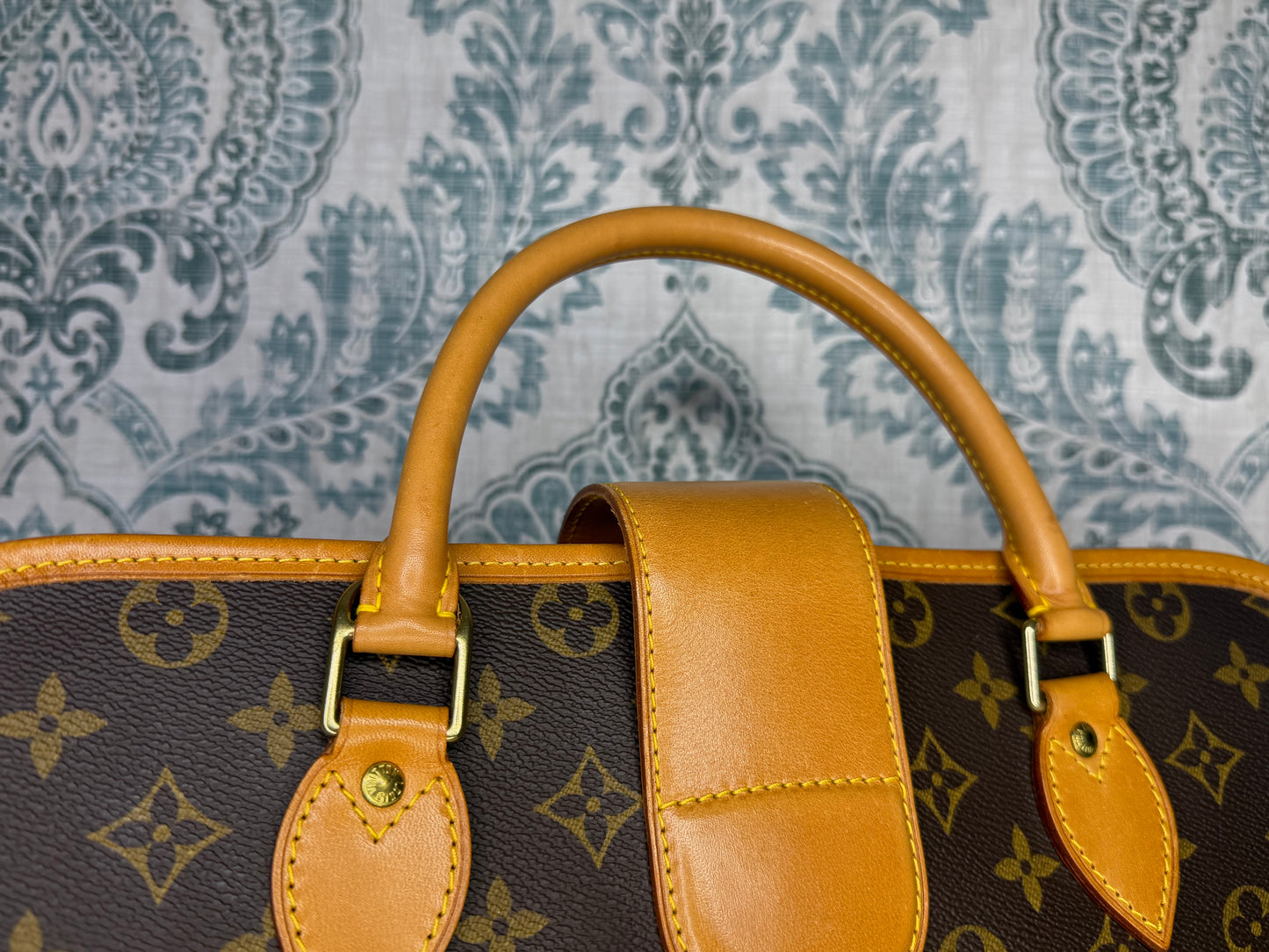 Louis Vuitton Rivoli Handbag