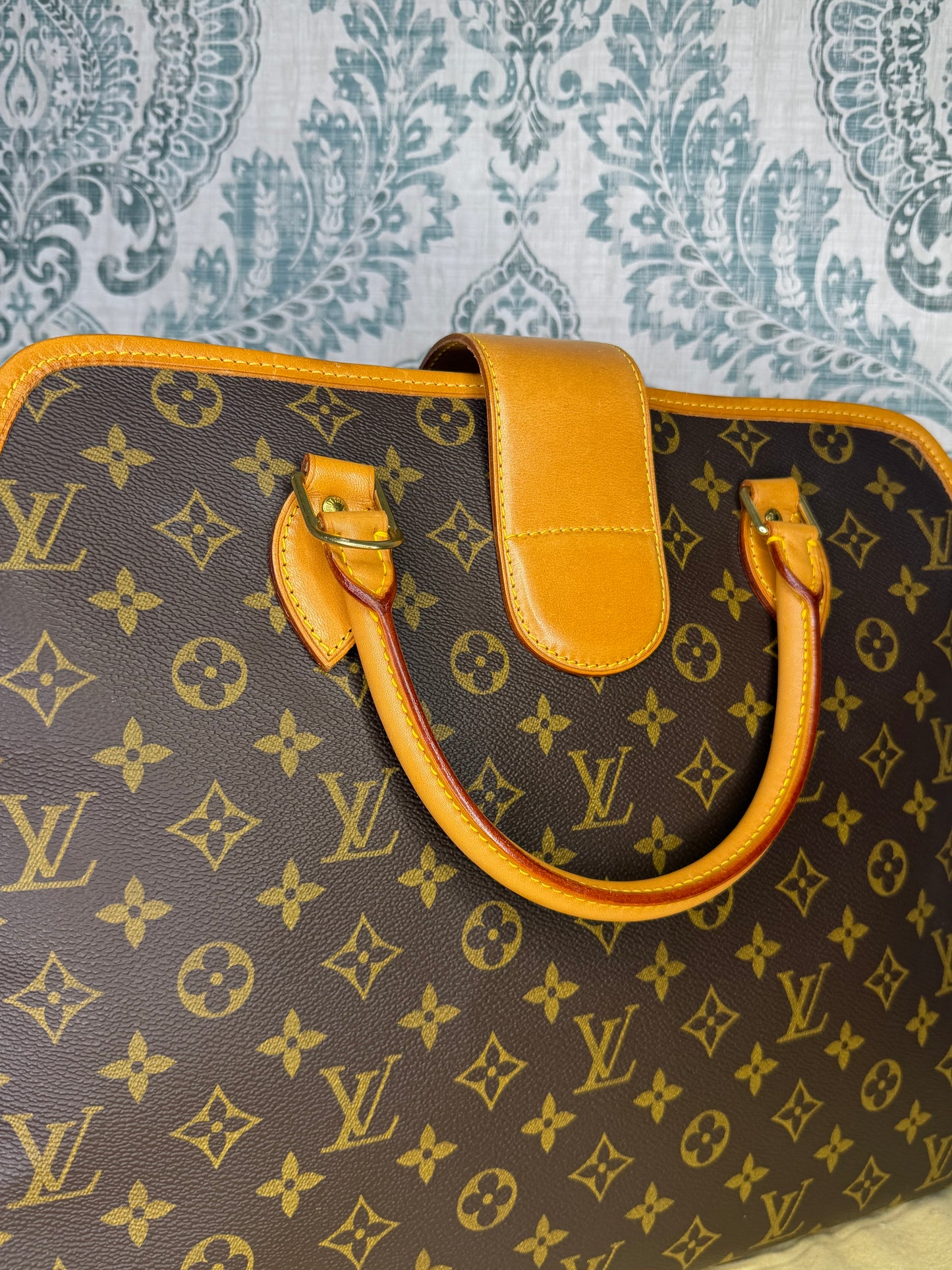 Louis Vuitton Rivoli Handbag