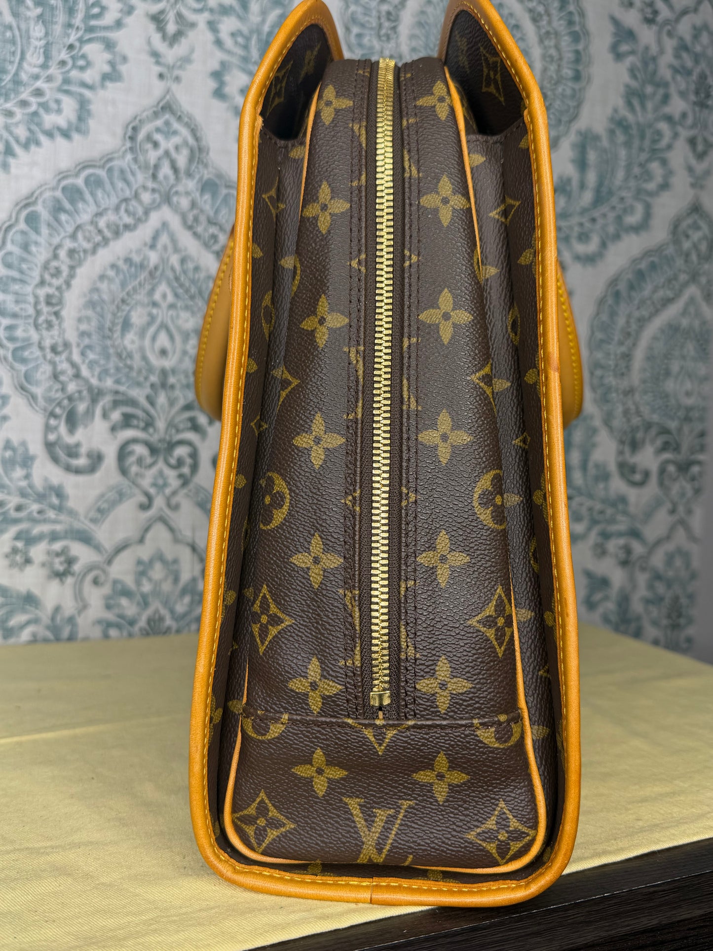 Louis Vuitton Rivoli Handbag