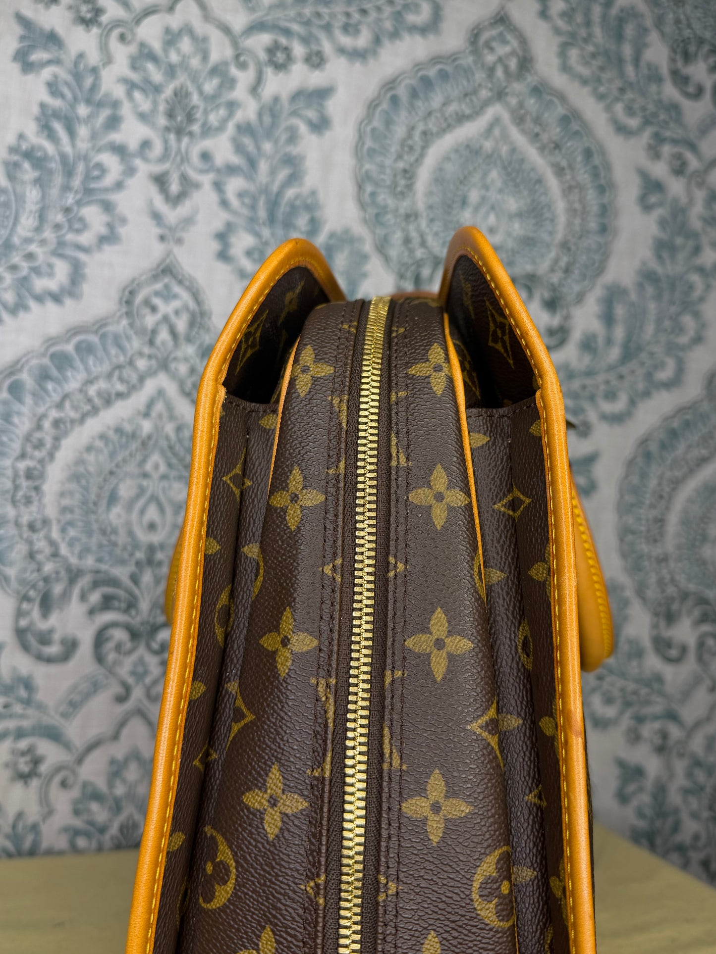 Louis Vuitton Rivoli Handbag