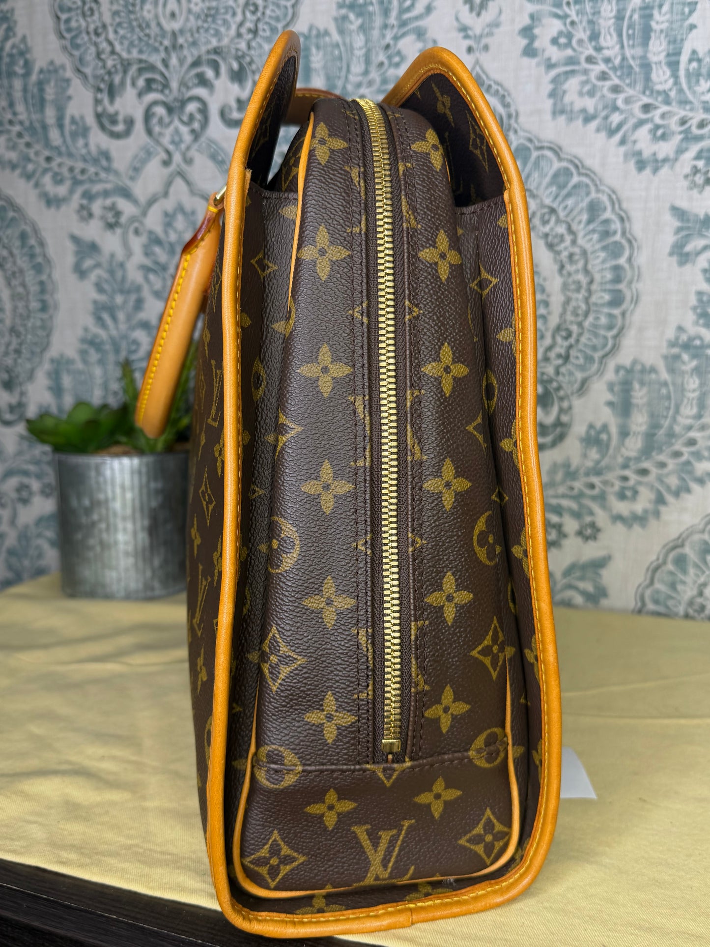 Louis Vuitton Rivoli Handbag