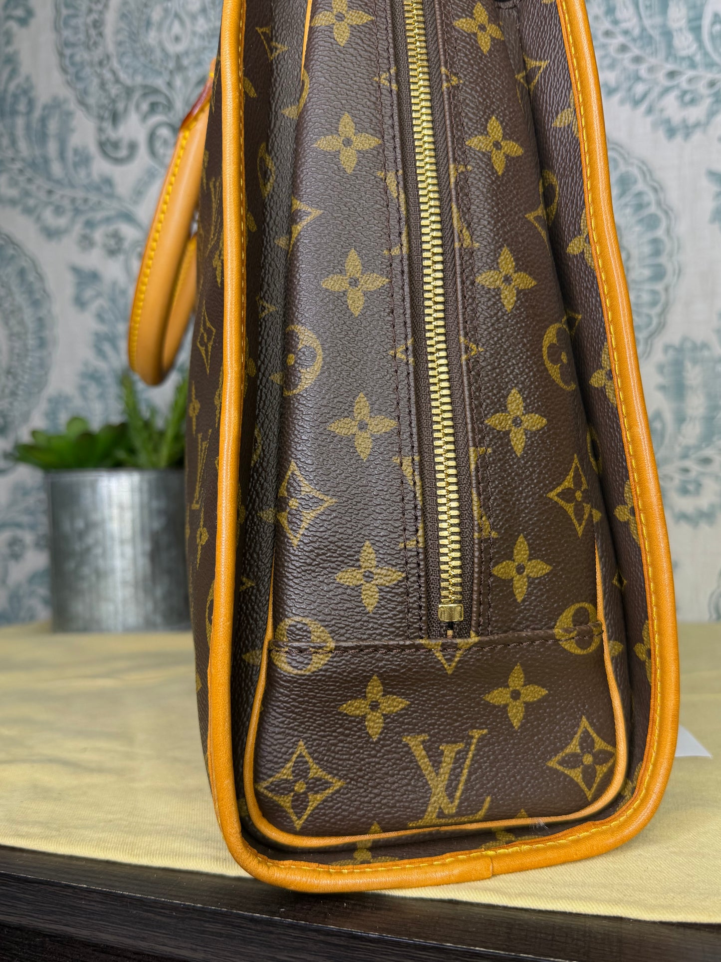 Louis Vuitton Rivoli Handbag