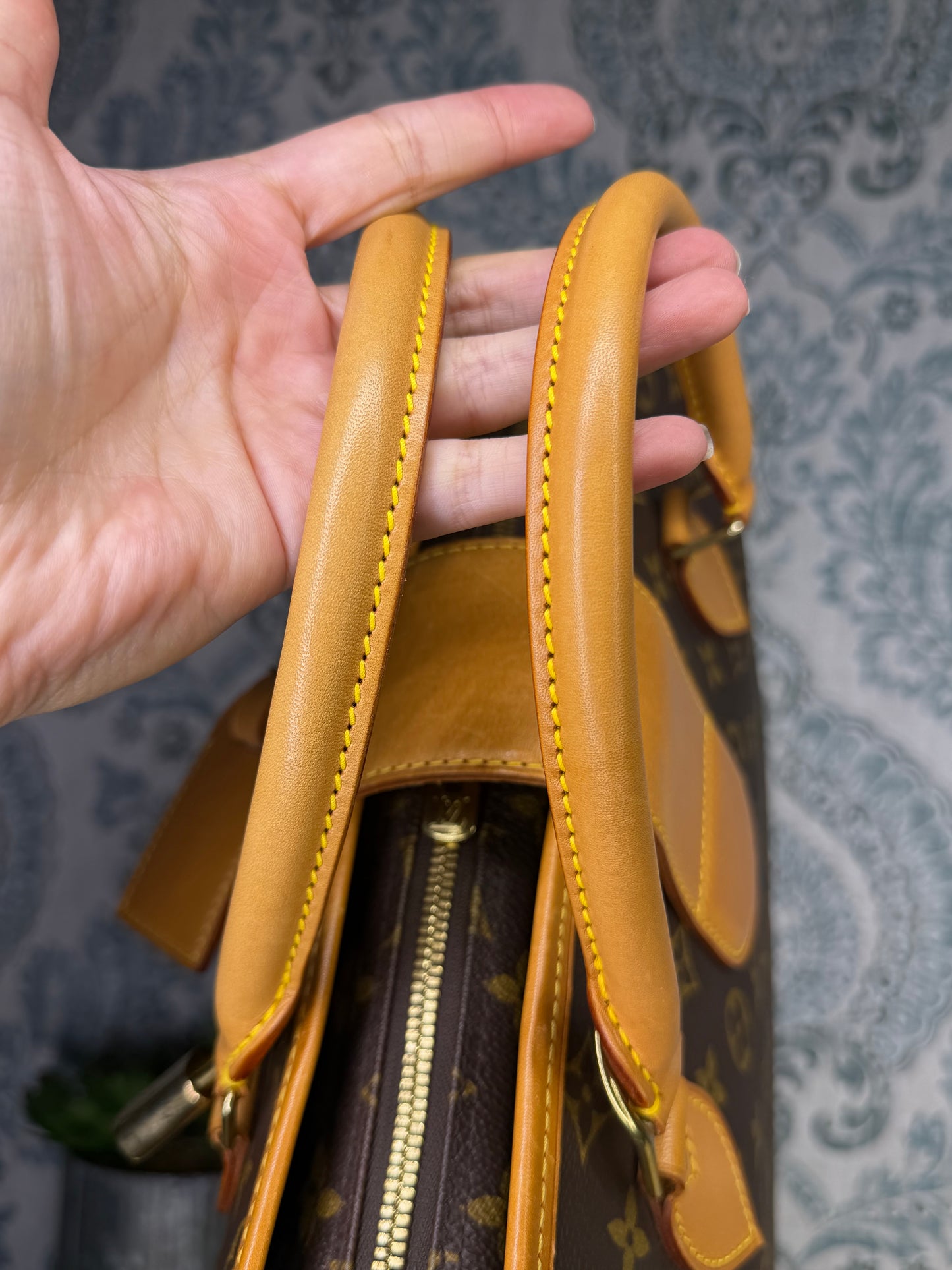 Louis Vuitton Rivoli Handbag