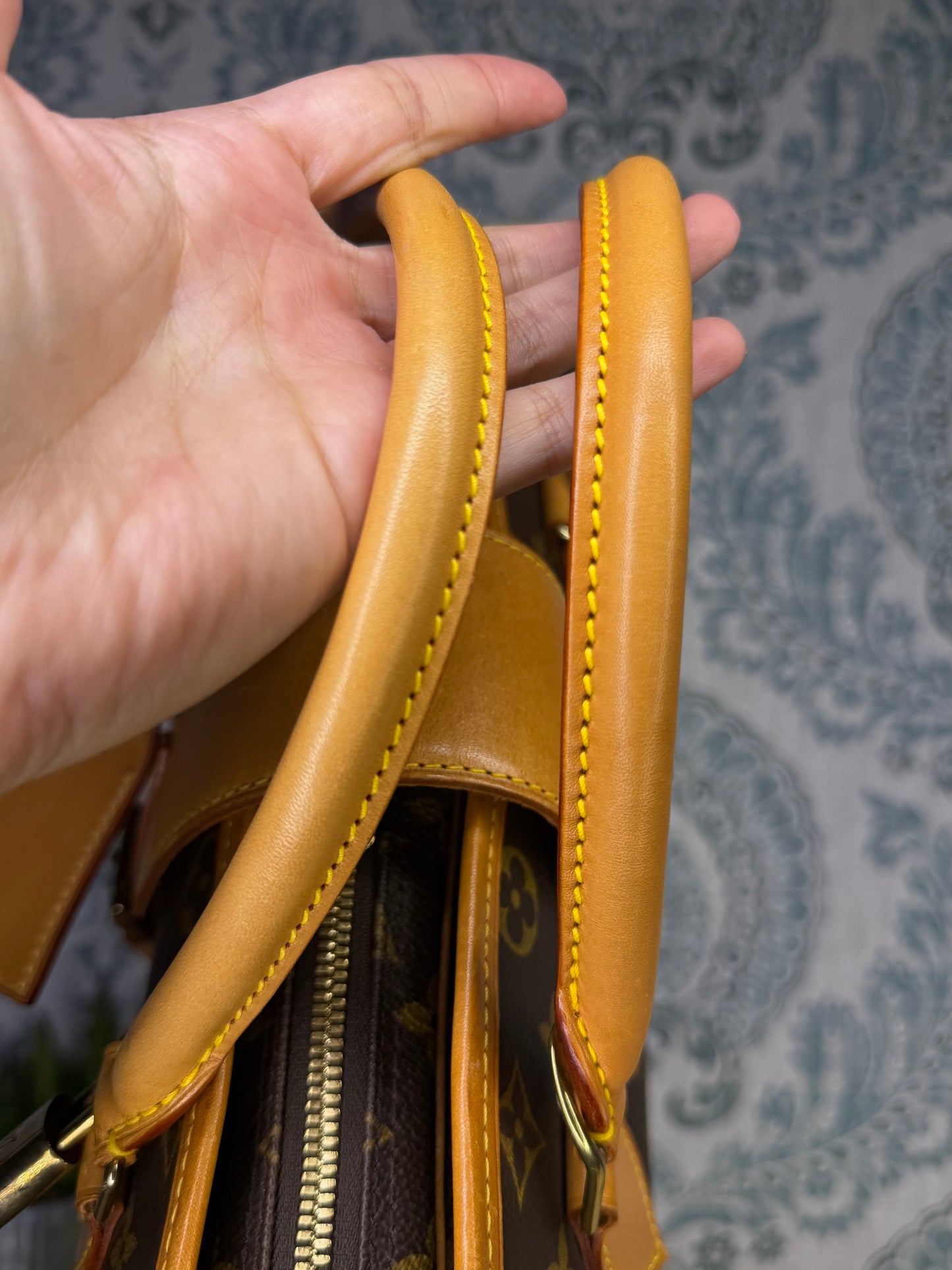 Louis Vuitton Rivoli Handbag