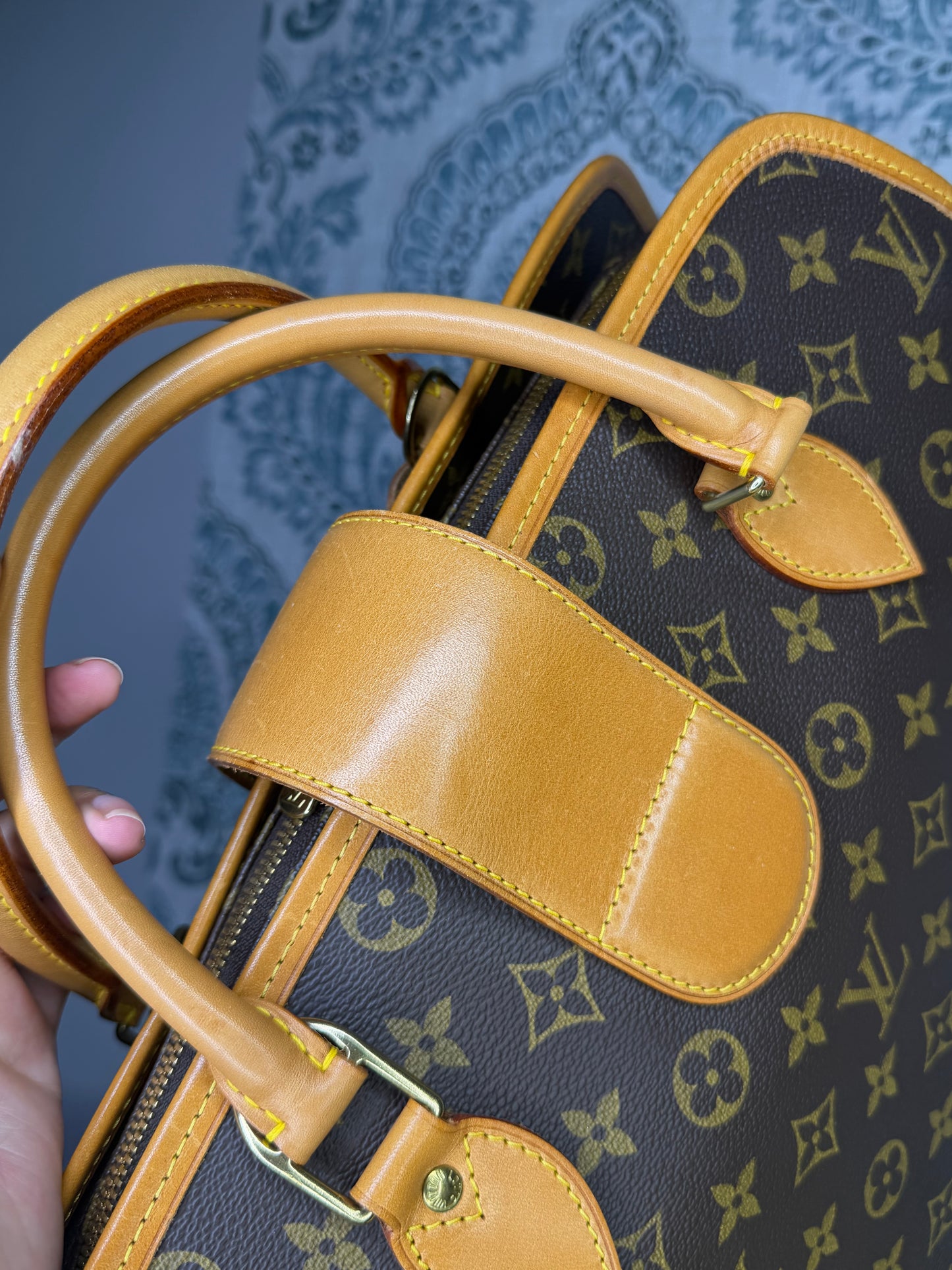 Louis Vuitton Rivoli Handbag