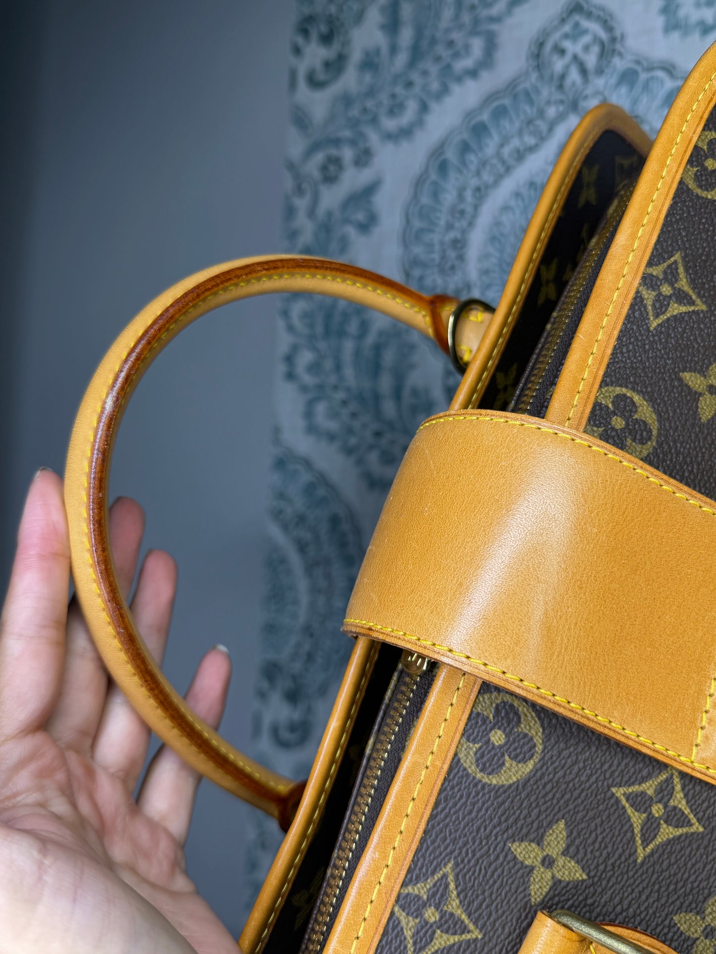 Louis Vuitton Rivoli Handbag