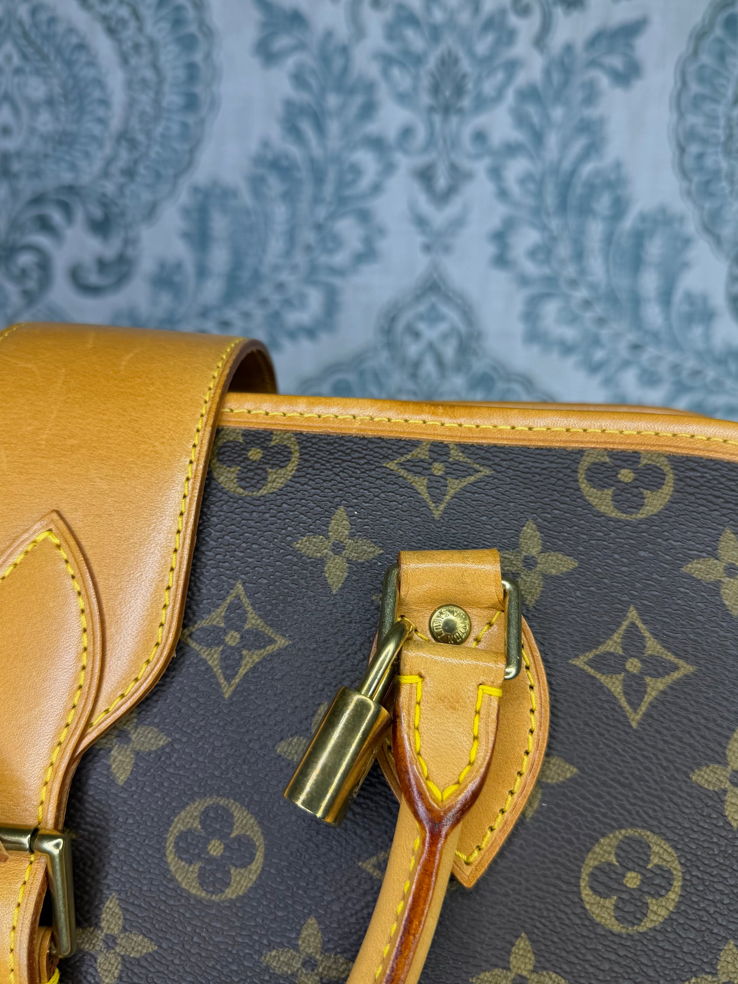 Louis Vuitton Rivoli Handbag