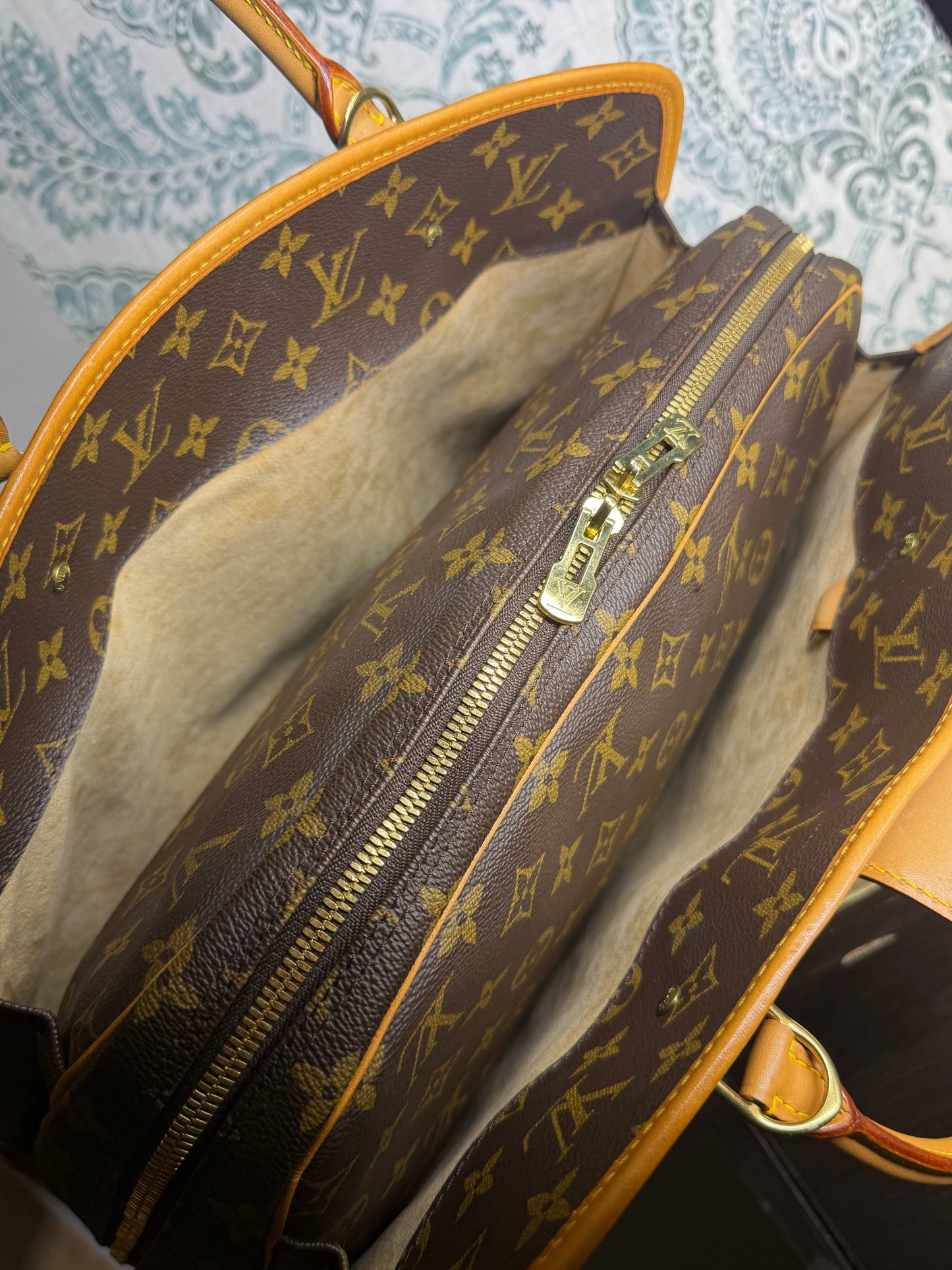 Louis Vuitton Rivoli Handbag