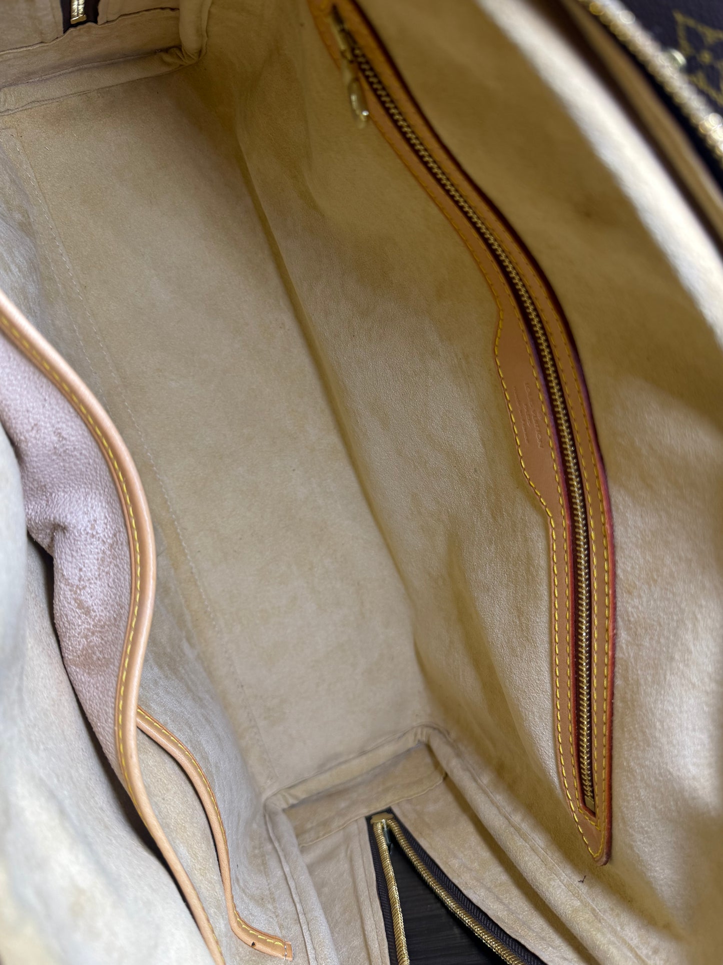 Louis Vuitton Rivoli Handbag