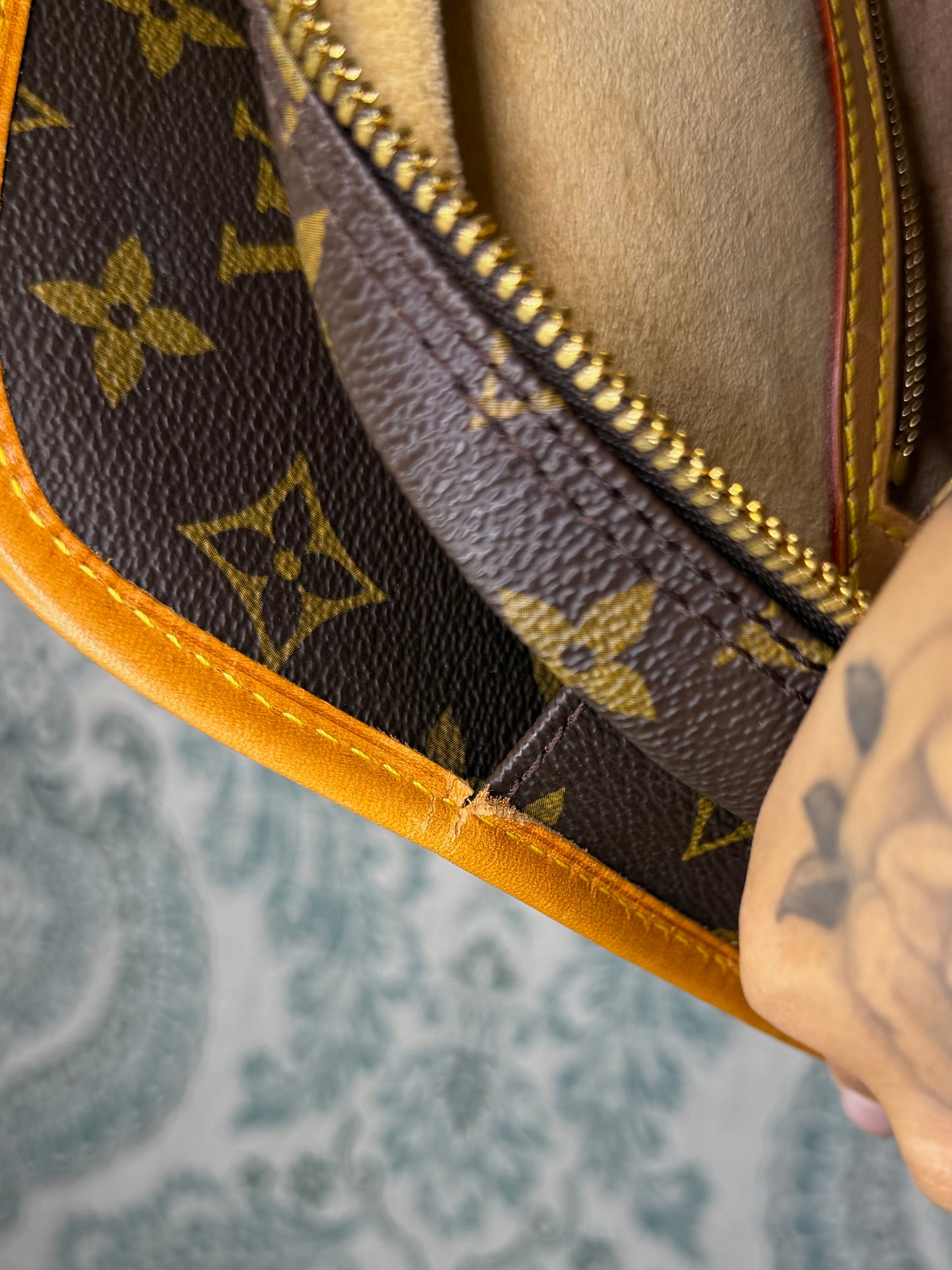 Louis Vuitton Rivoli Handbag