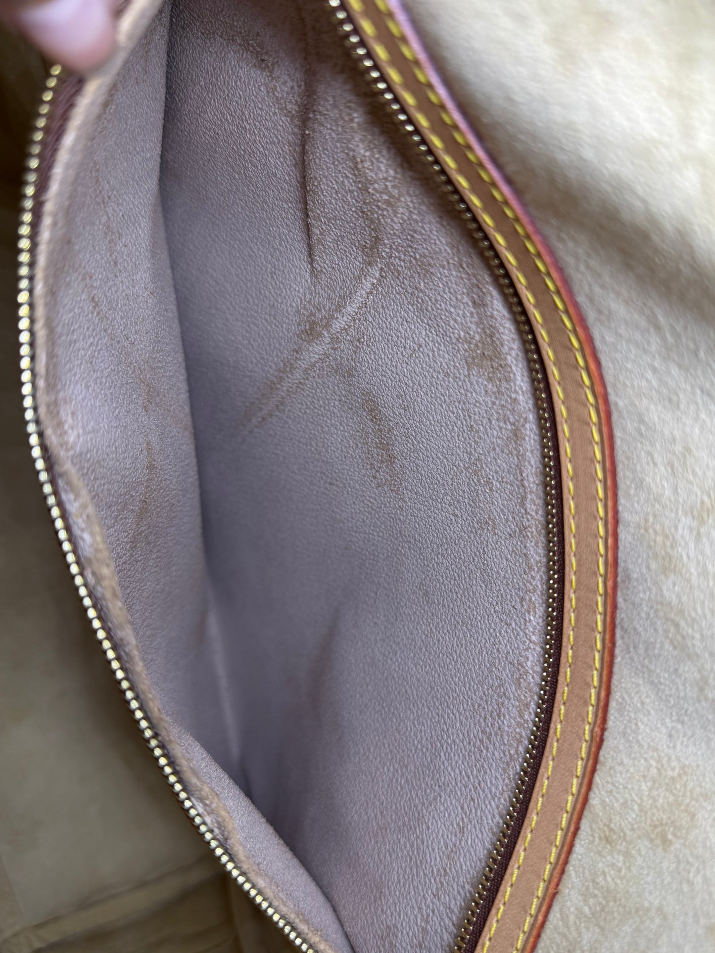 Louis Vuitton Rivoli Handbag